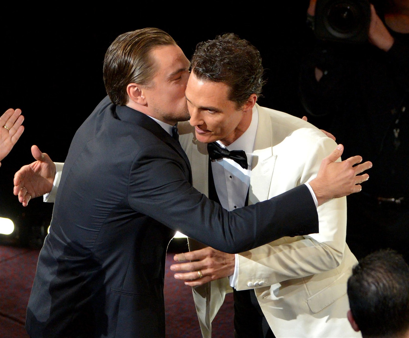 Matthew McConaughey hugs Leonardo DiCaprio at the 86th Academy Awards