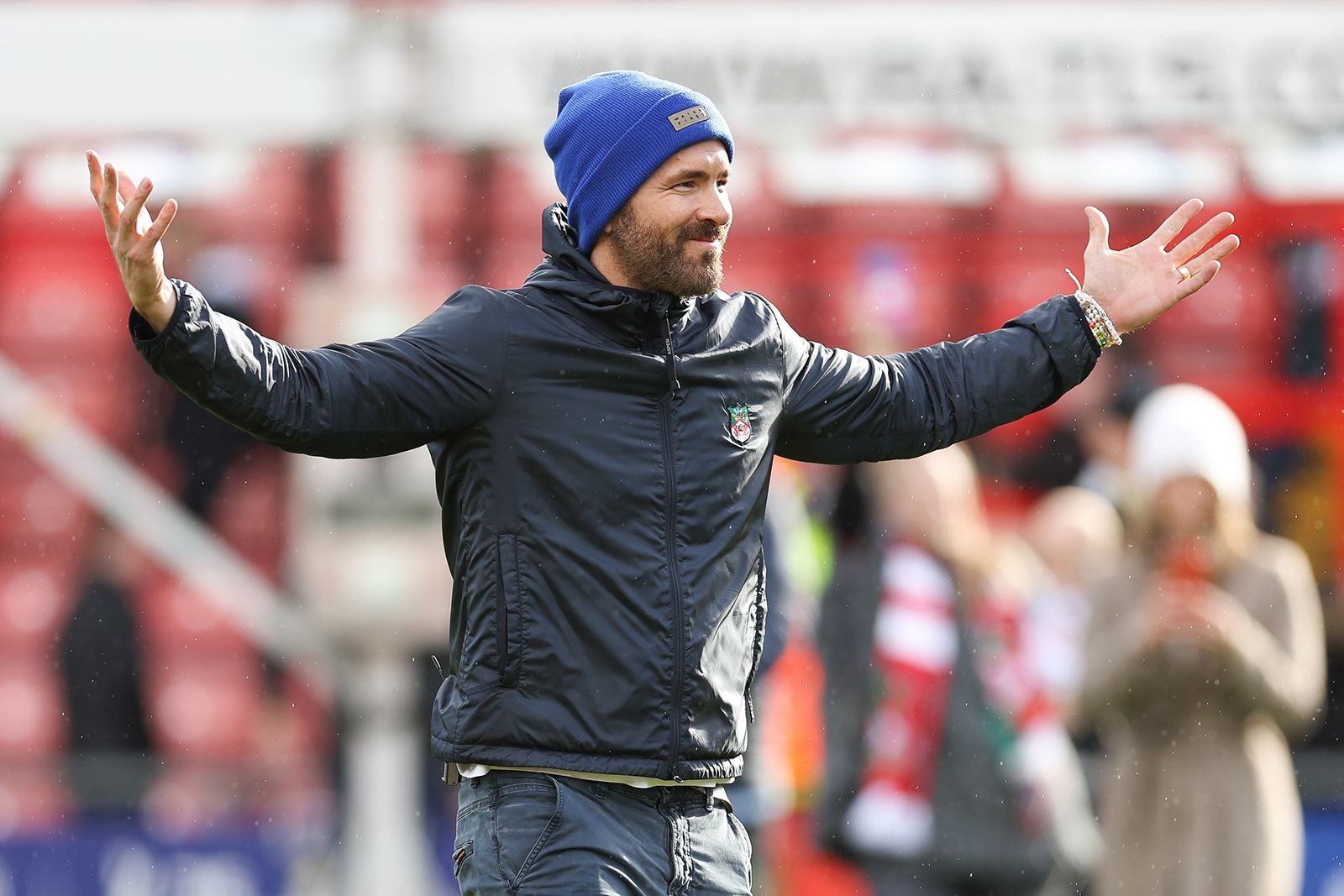 Ryan Reynolds on the field at Wrexham's game
