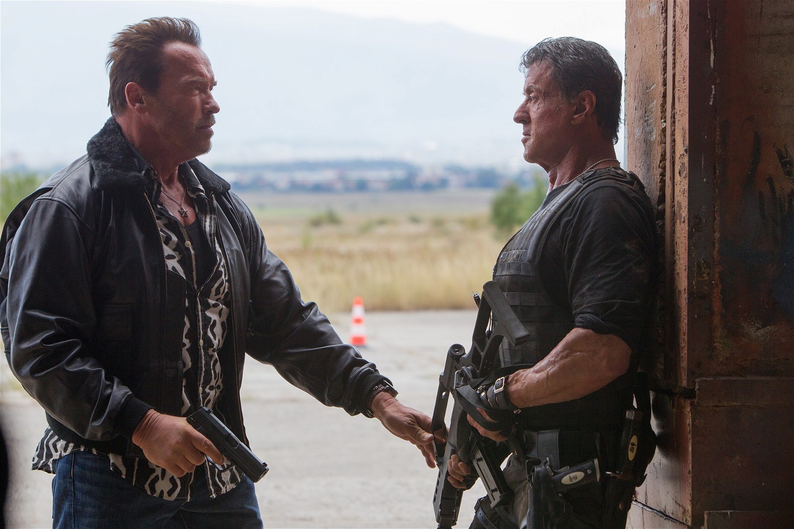Sylvester Stallone and Arnold Schwarzenegger in a still from The Expendables