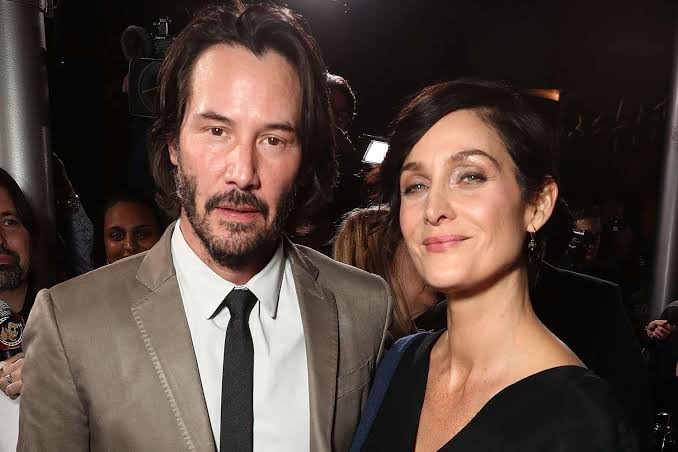 Keanu Reeves and Carrie Anne Moss