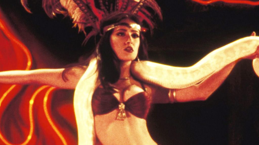 Quentin Tarantino Used Madonna to Make Salma Hayek Face Her Worst Nightmare in This $59M Cult Classic 1 Salma Hayek with a Python in From Dusk Till Dawn.