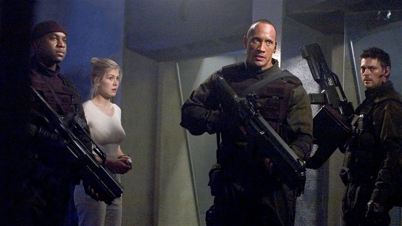 Dwayne Johnson and Rosamund Pike in a still from the film