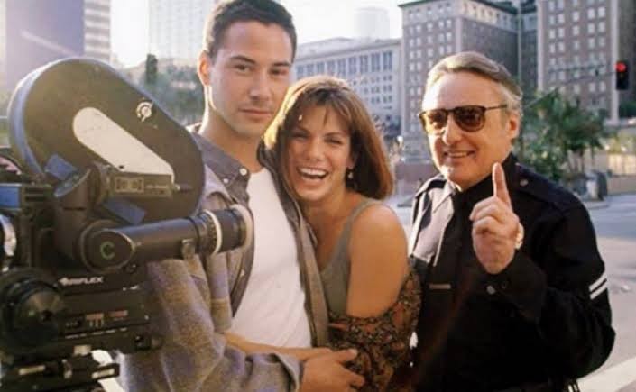 Keanu Reeves, Sandra Bullock, and Dennis Hopper in bts of Speed