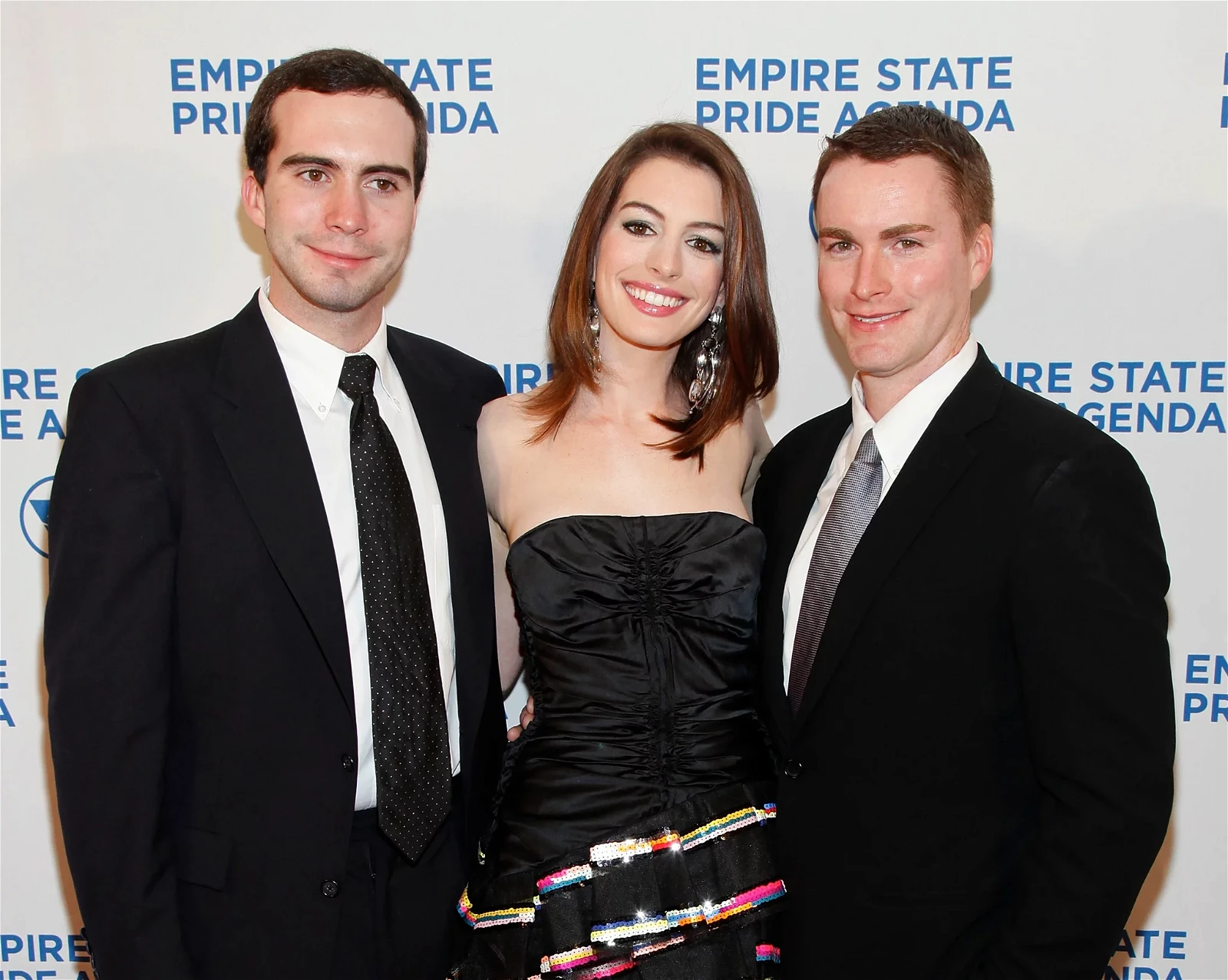 Anne Hathaway and her brothers