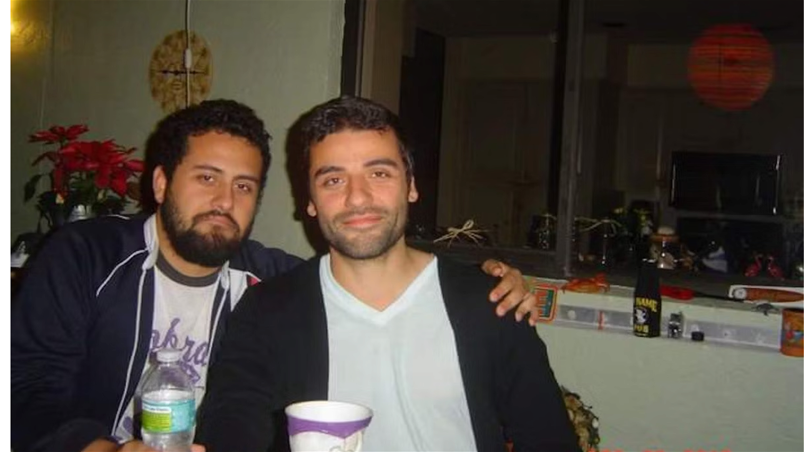 Oscar Isaac poses with his brother Michael 