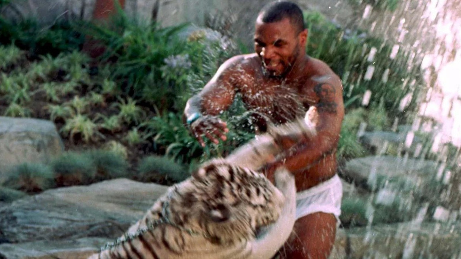 Mike Tyson along with his pet tiger