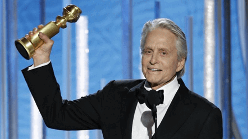 Michael Douglas winning an award 