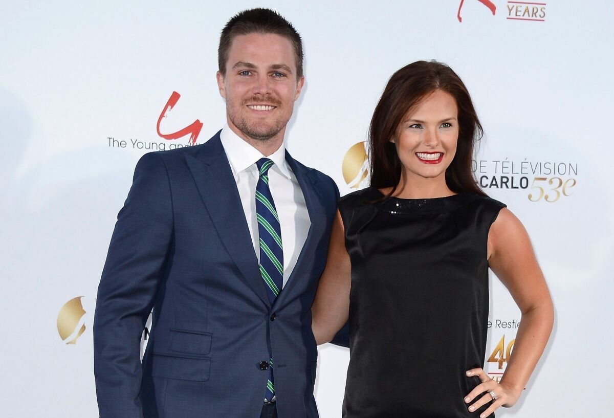Stephen Amell with wife