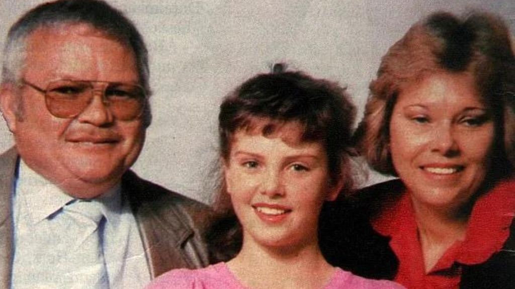 Charlize Theron with her parents 