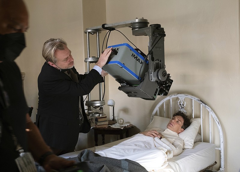 Christopher Nolan working a shot for Oppenheimer using an IMAX camera