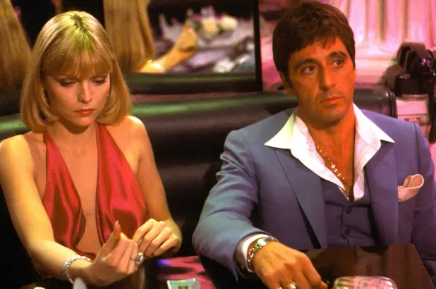 Al Pacino and Michelle Pfeiffer in Scarface (1983)