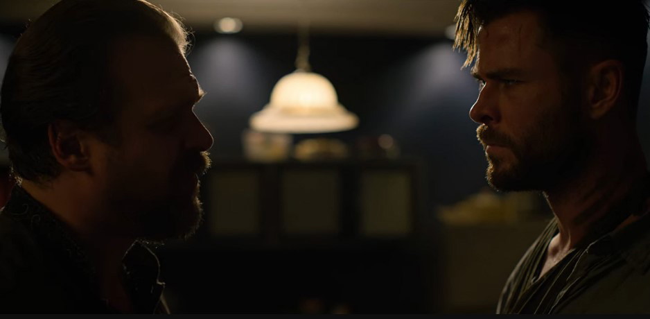 David Harbour and Chris Hemsworth in Extraction (2020)