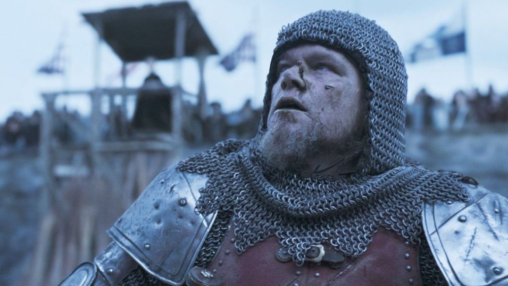 Matt Damon wearing the heavy armor in The Last Duel