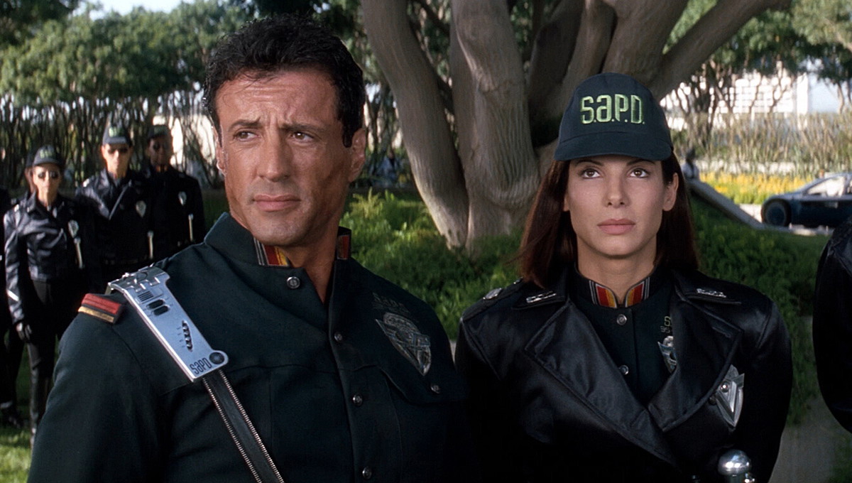 Sylvester Stallone and Sandra Bullock in Demolition Man (1993)