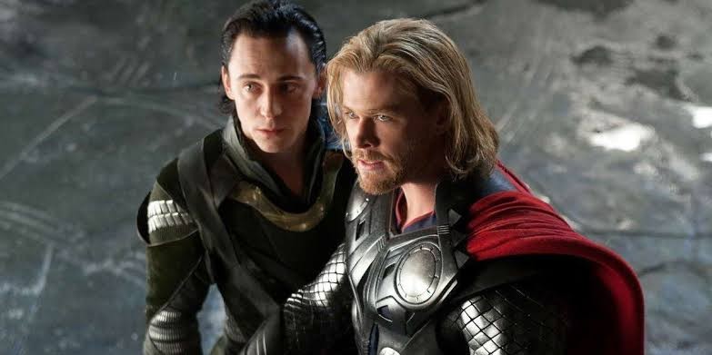 Tom Hiddleston and Chris Hemsworth as Loki and Thor respectively.