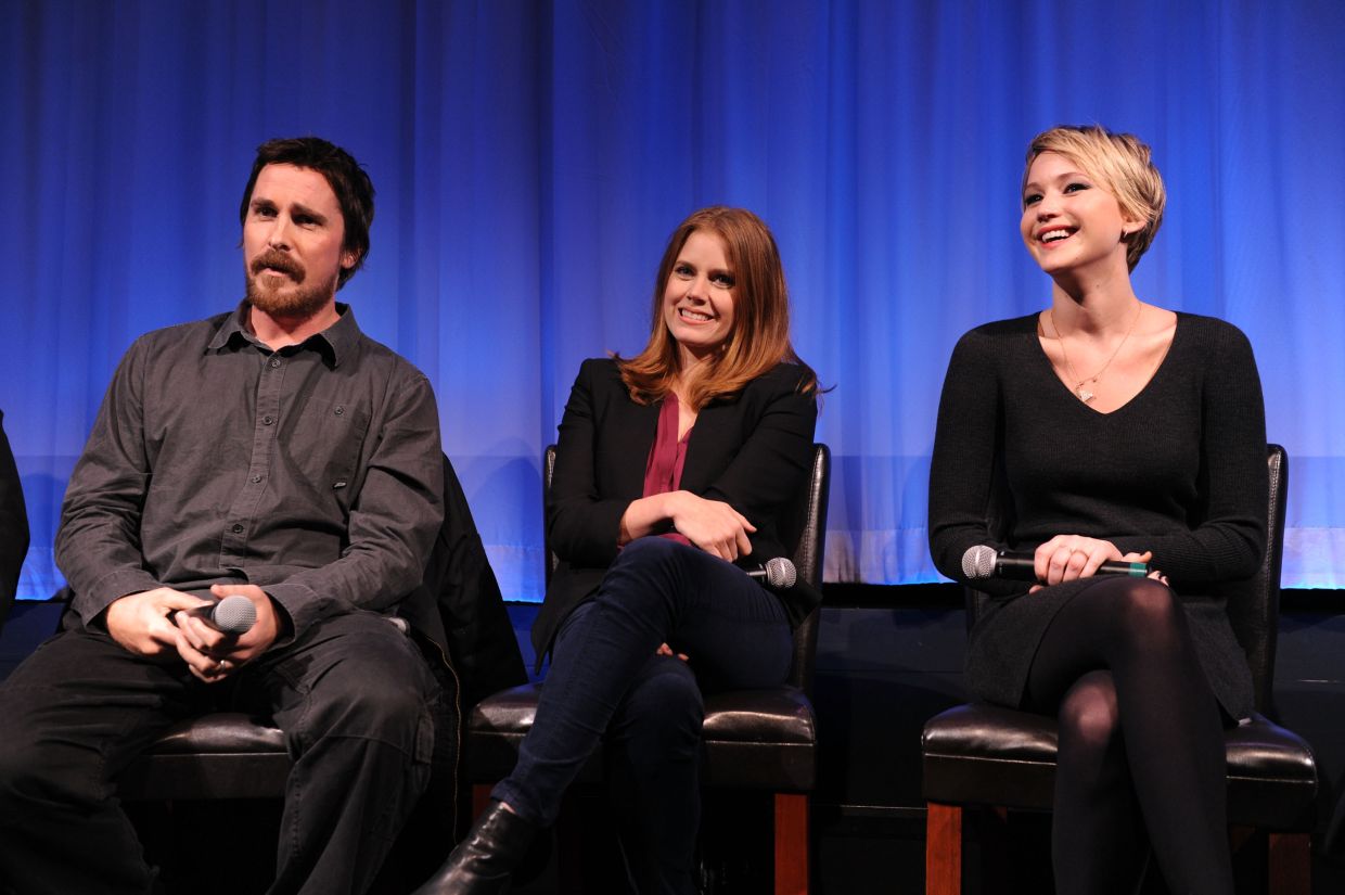 Christian Bale, Amy Adams, and Jennifer Lawrence.