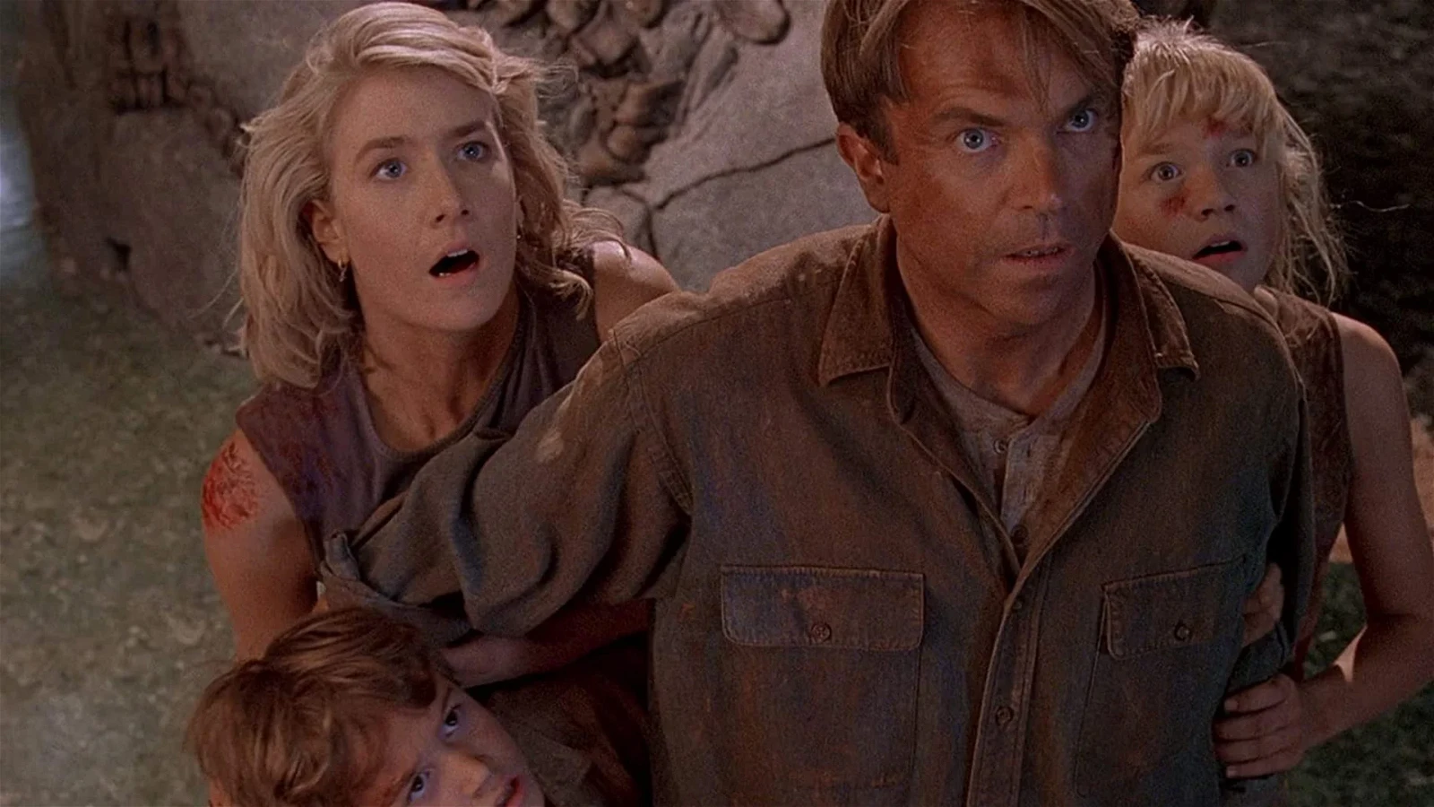 A still of Laura Dern and Sam Neill from Jurassic Park (1993).