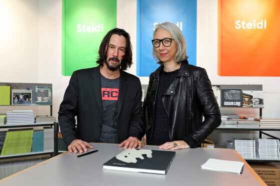 Keanu Reeves and Alexandra Grant with their book, "Ode to happiness"