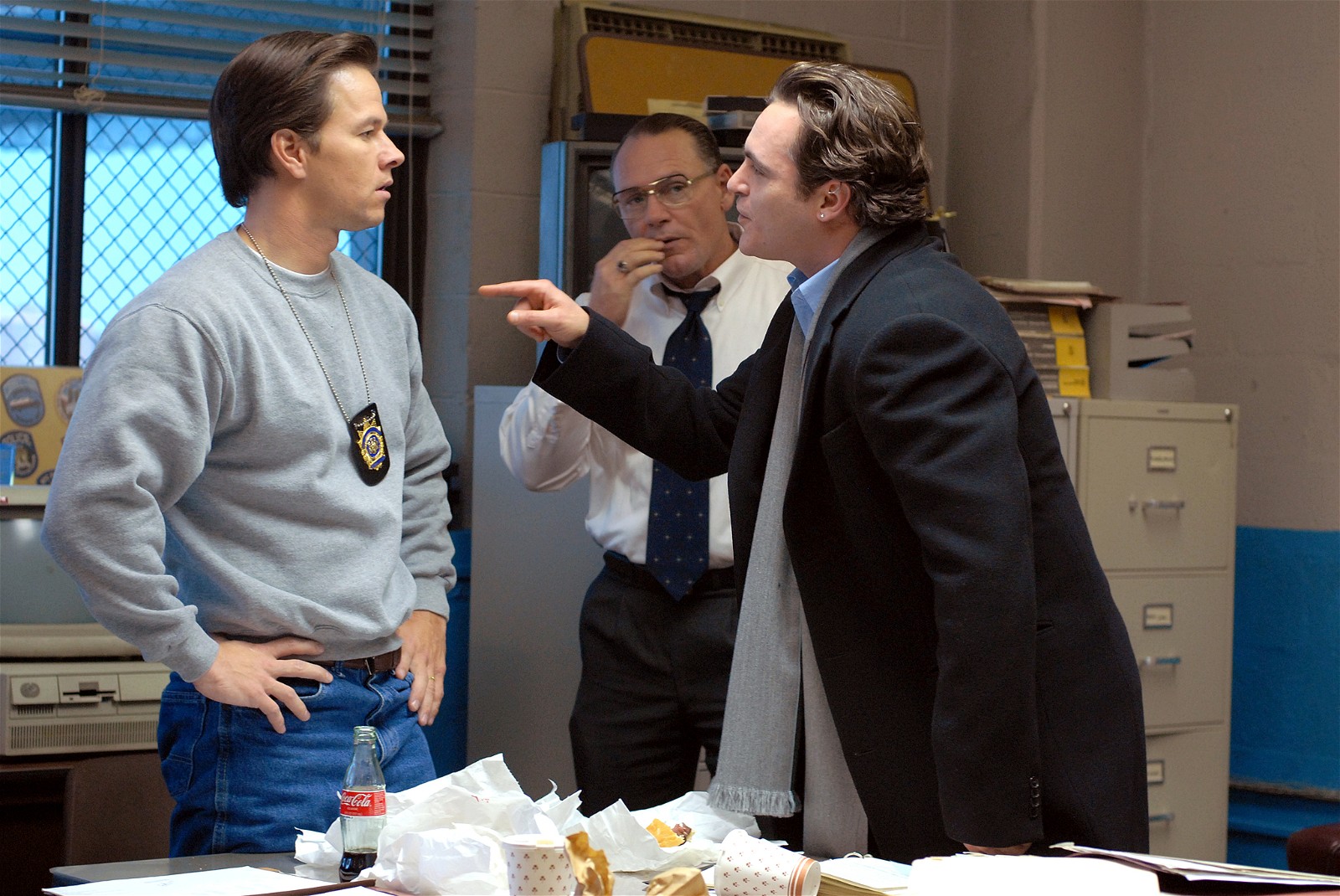 Mark Wahlberg as Joseph Grusinsky and Joaquin Phoenix as Bobby