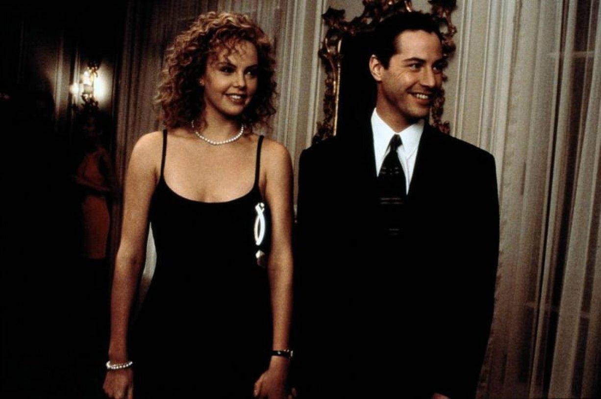 Keanu Reeves and Charlize Theron in The Devil's Advocate (1997)