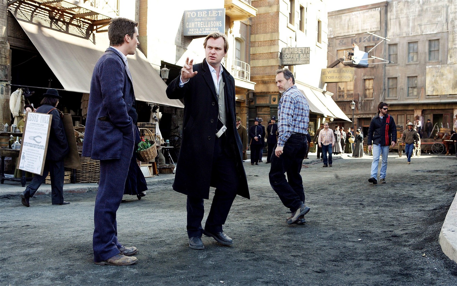 Christian Bale and Christopher Nolan on the sets of The Prestige (2006).