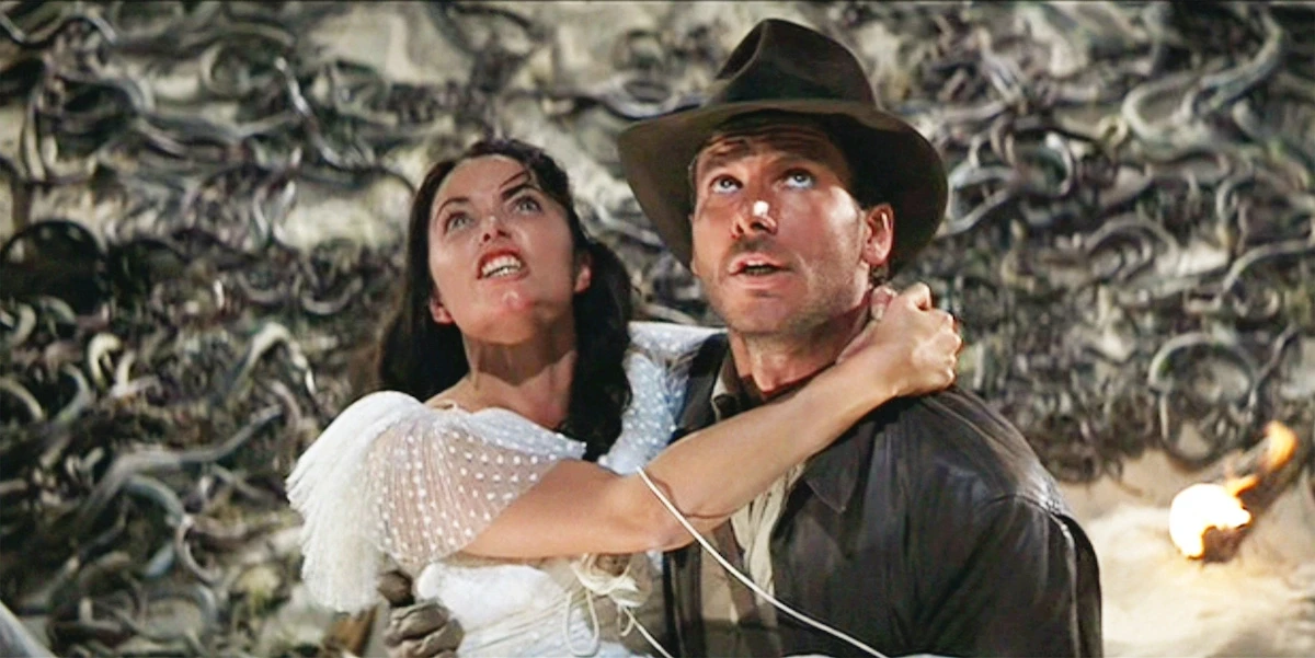 Karen Allen and Harrison Ford as Marion and Indy