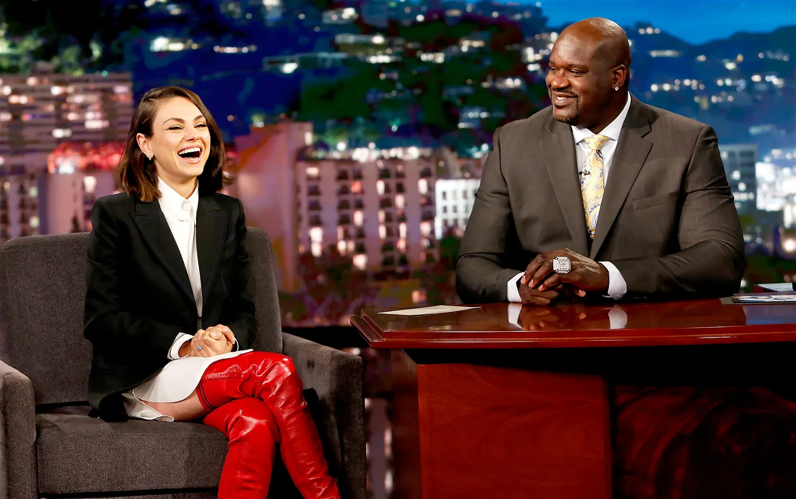 Mila Kunis and Shaquille O’Neal 