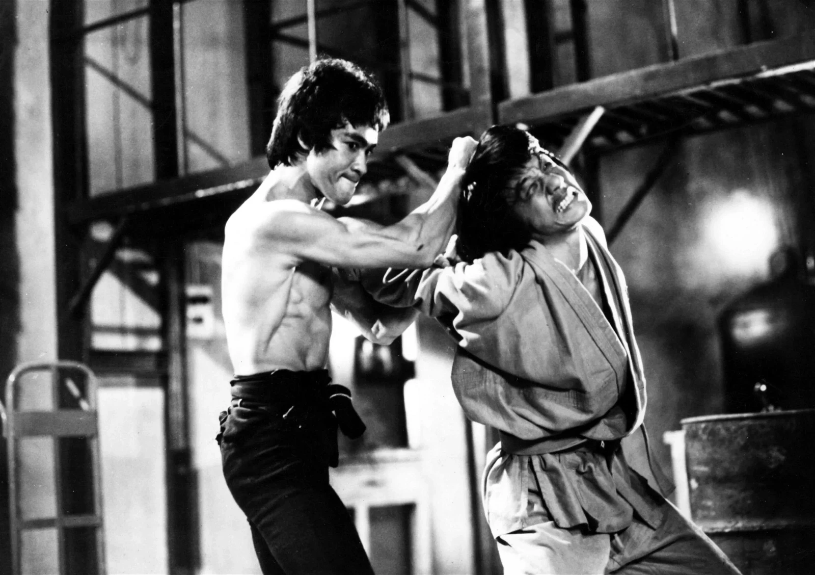 Jackie Chan and the late Bruce Lee in a still from Enter the Dragon (1973)