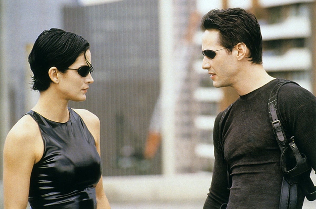 Keanu Reeves and Carrie-Anne Moss in The Matrix (1999).