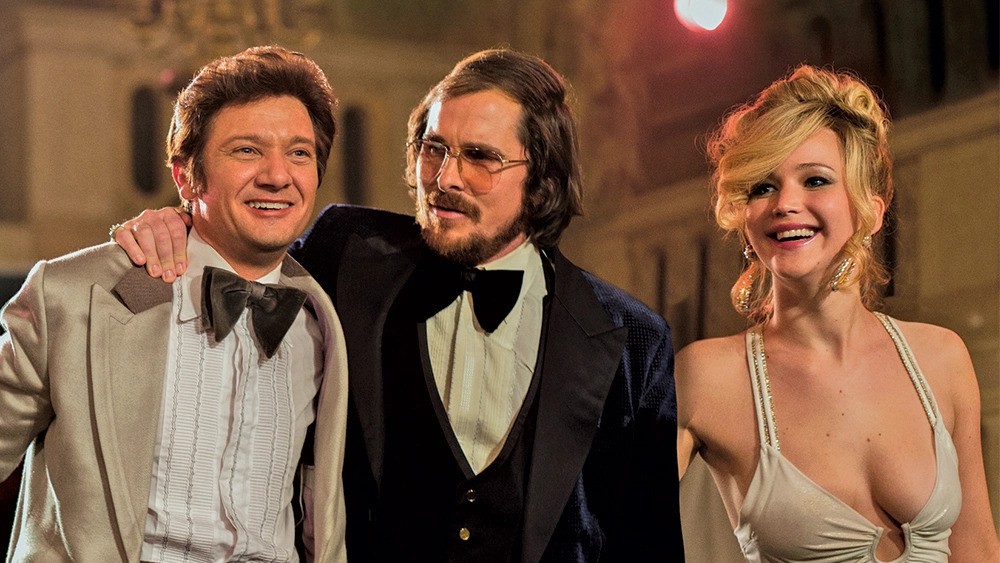 Jennifer Lawrence, Jeremy Renner and Christian Bale in American Hustle