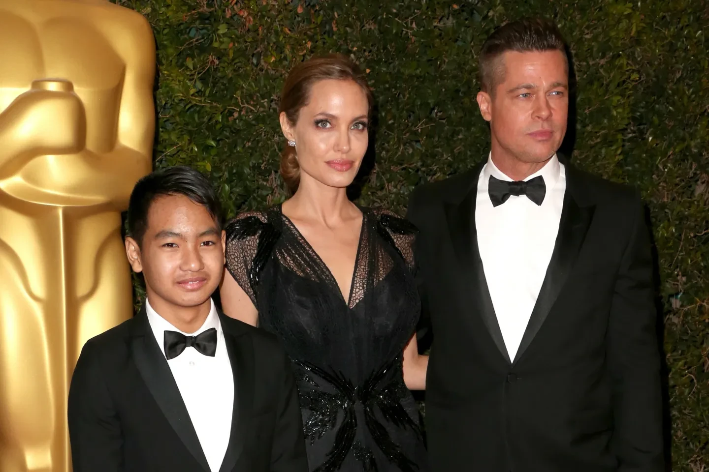 Maddox, Angelina Jolie, and Brad Pitt
