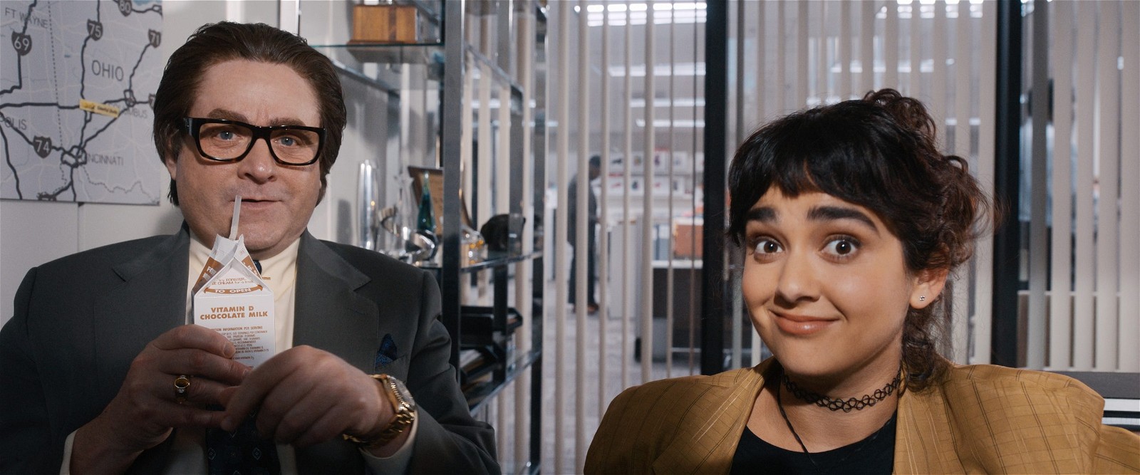 Zach Galifianakis and Geraldine Viswanathan in "The Beanie Bubble," premiering July 28, 2023 on Apple TV+.