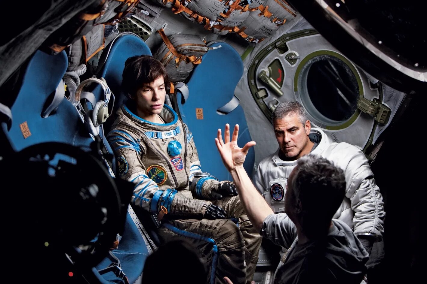 Sandra Bullock and George Clooney on the set of Gravity