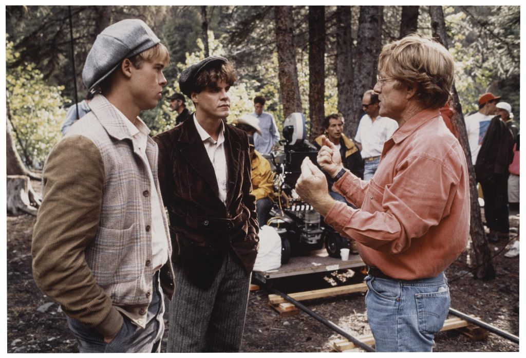 Robert Redford with Brad Pitt behind the scenes 