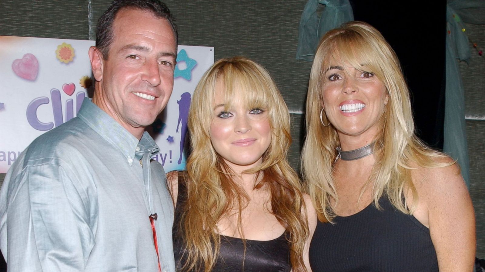 Lindsay Lohan with her parents