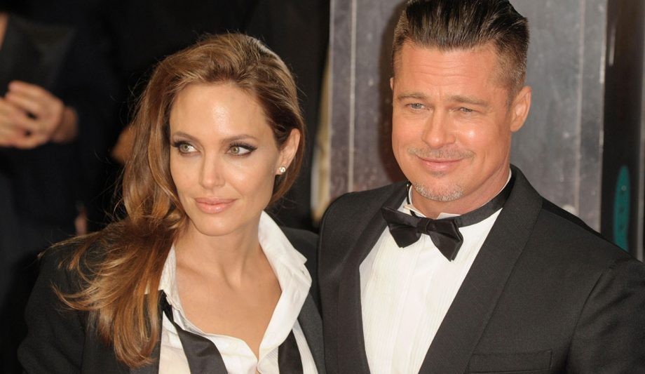 Angelina Jolie and Brad Pitt at an event in 2014