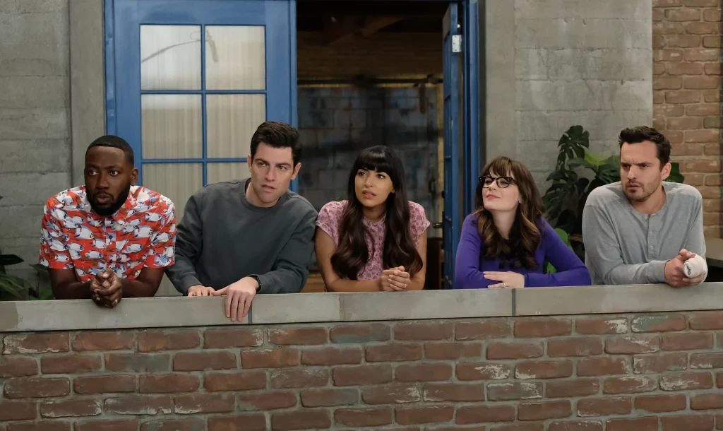 Zooey Deschanel with the cast of New Girl