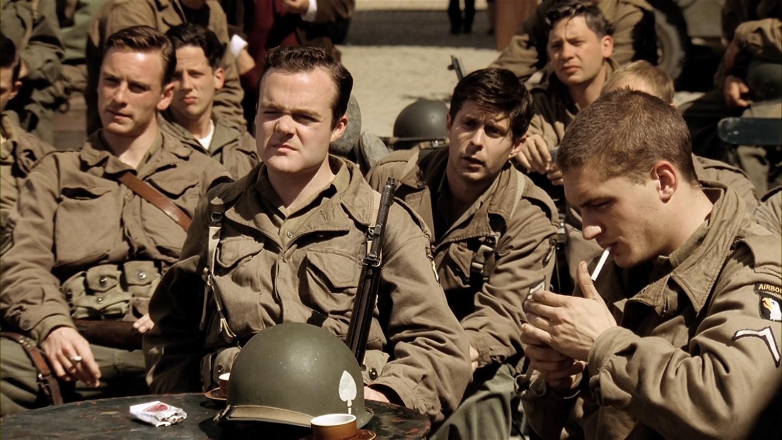 Michael Fassbender (extreme left) and Tom Hardy (extreme right) in a still from Band of Brothers
