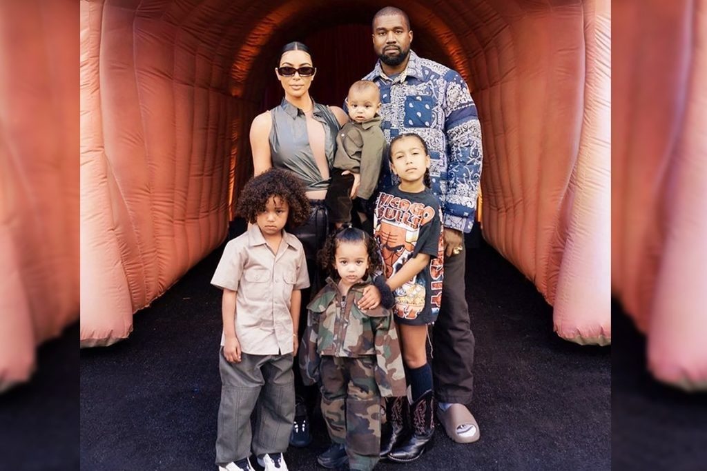 Kanye West and Kim Kardashian with their children
