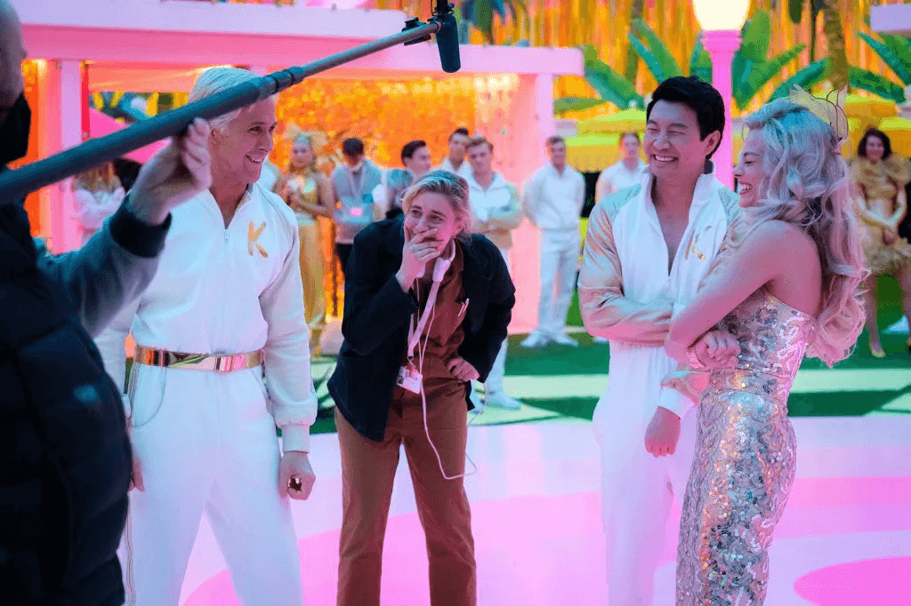 Ryan Gosling, Greta Gerwig, Simu Liu, and Margot Robbie on the sets of Barbie
