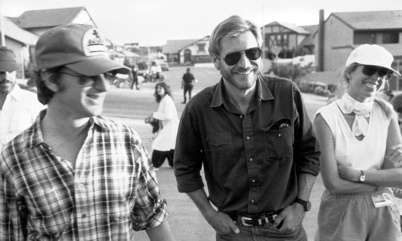 Steven Spielberg (left) with Harrison Ford and screenwriter Melissa Mathison, on the set of E.T.