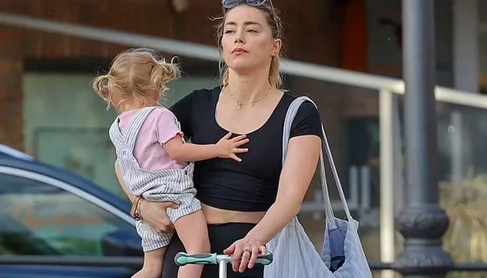 Amber Heard with daughter Oonagh Paige in Spain
