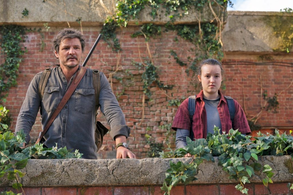 Pedro Pascal and Bella Ramsey star as Joel Miller and Ellie Williams in HBO's The Last of Us.