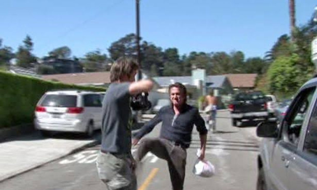 Sean Penn caught on camera kicking a photographer