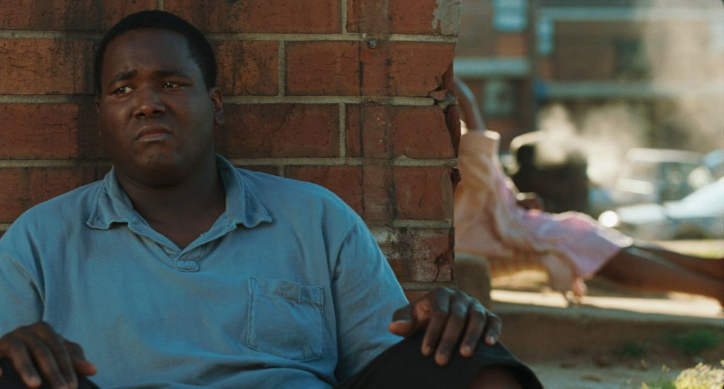 Quinton Aaron as Michael Oher in a still from The Blind Side