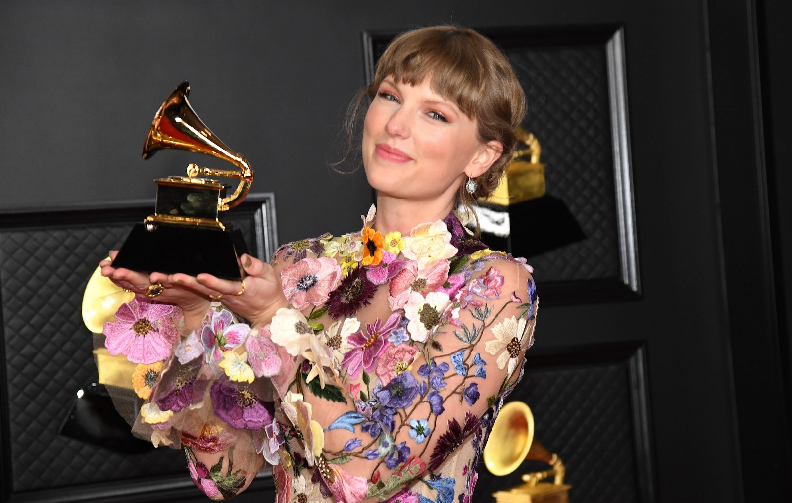Taylor Swift at the Grammy Awards 2021 with her Grammy