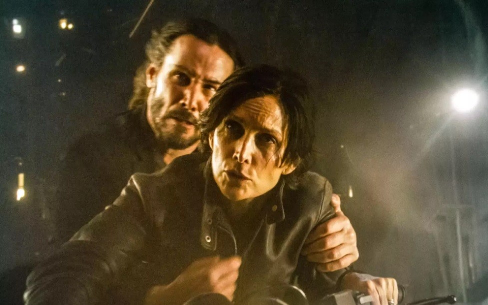 Keanu Reeves and Carrie-Anne Moss 