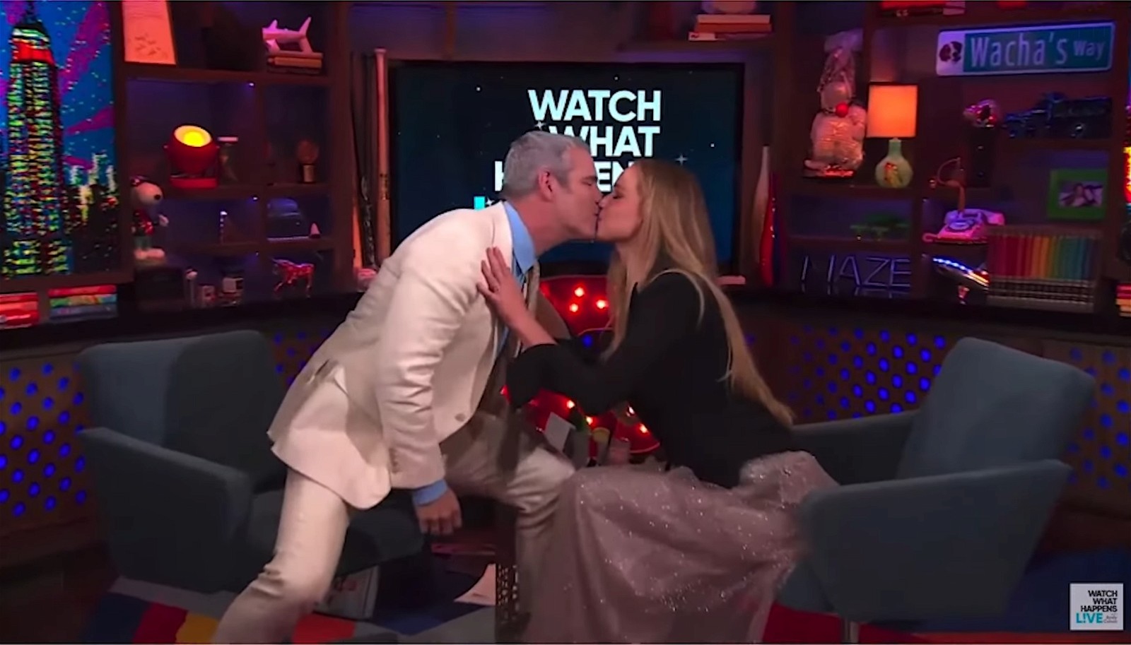 Jennifer Lawrence and Andy Cohen kissing 
