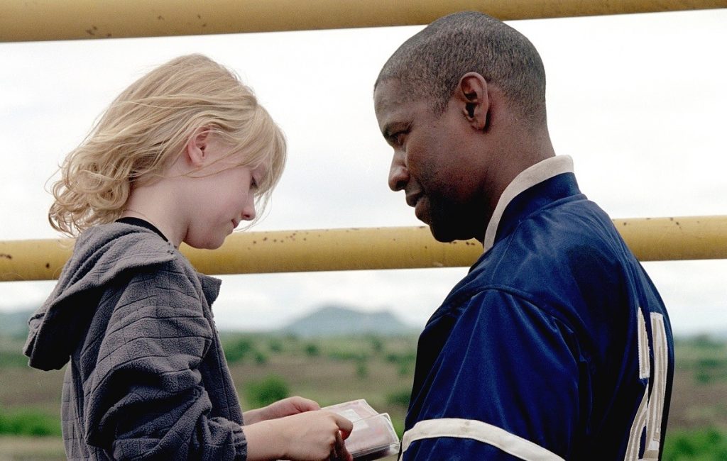 Denzel Washington and Dakota Fanning in a still from Man on Fire