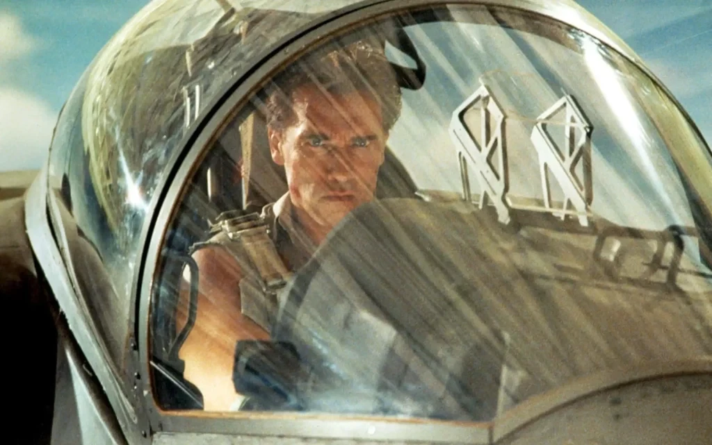 Arnold Schwarzenegger in a still from the climax scene of True Lies (1994)